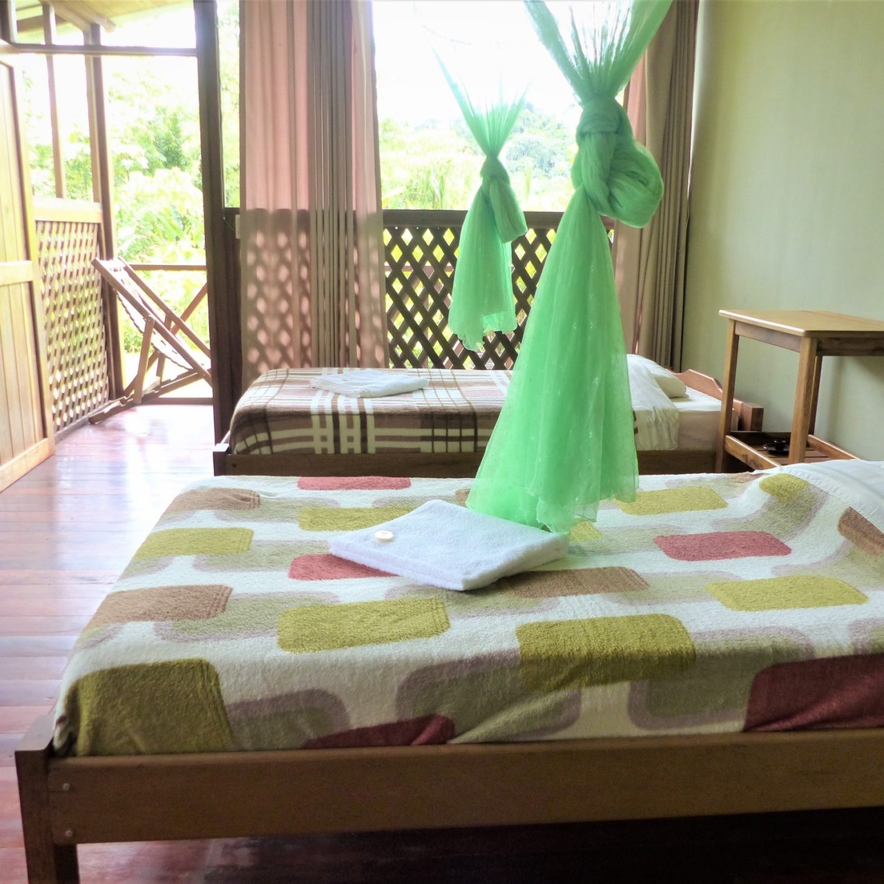 https://www.guadalupelodgemanu.com/wp-content/uploads/2023/03/habitacion-doble-guadalupe-lodge-1-1280x1280.jpg